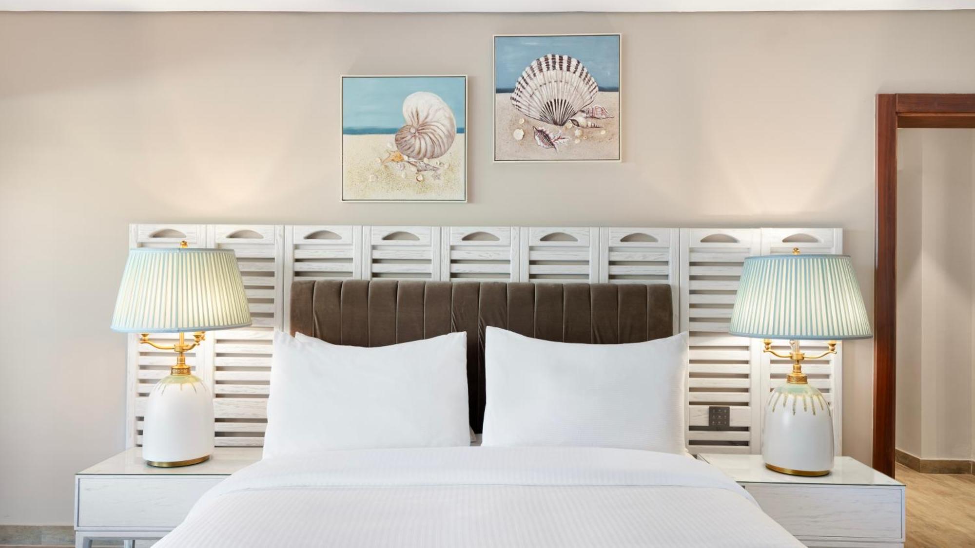 Rixos Premium Alamein Ел Аламейн Стая снимка A bedroom at Hilton Garden Inn
